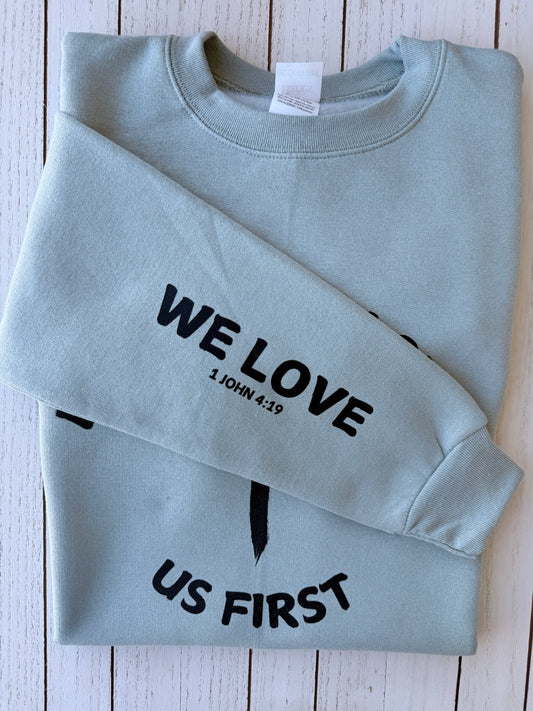 Because He Loved Us First CrewNeck Sweater "We Love" Sleeve Print