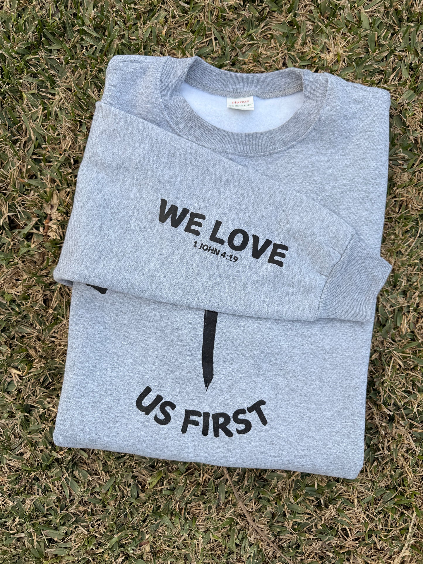 Because He Loved Us First CrewNeck Sweater "We Love" Sleeve Print